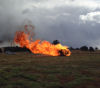 Propane Tank on fire in training field.
